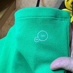 Puma WOMENS BUTTON GREEN POLO SIZE MEDIUM Photo 7