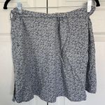 Brandy Melville Blue and White Floral Wrap Mini Skirt OS Photo 0