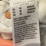 American Eagle Light Wash  Ripped Mom Jeans Women’s 00 regular  Photo 1