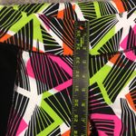 Fabletics tribal penzy print capri legging jogger in neon orange, pink and green Photo 6