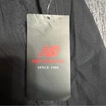 New Balance  Women’s Core Woven Shorts Photo 7