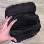 Black multi use pocketed card holder travel satchel handbag Photo 6