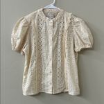 Industry Embroidered Eyelet Puff Sleeve Button Photo 0