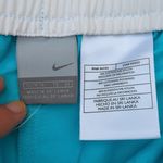 NWT Low Rise Swishy Pants | Women's Nike Blue Track Pants Photo 5