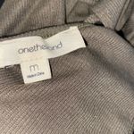 onetheland bodysuit cutout side detail Photo 4