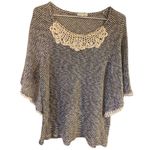 Ava James  black and white knit blouse Photo 1