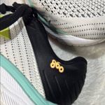 New Balance White and Black Athletic Shoes with Lime Accents Photo 8