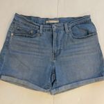 Levi's Levi’s mid length jean shorts Cuffed Light to medium wash Women’s size 30 Photo 1