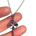 Silver Key Pendant Necklace With Purple Gemstone Accents & Chain Photo 0