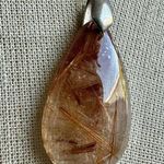 Rutilated quartz teardrop pendant necklace on cord Photo 2