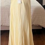 Yellow pleated dress Size L Photo 1