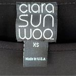NWT Clara Sun Woo Faux Leather Sleeve Top Black Generous Size XS Photo 1
