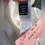 SheIn Mod Plus Size Curve 1XL
Blue Floral Sundress Boho Front Tie Corset Dress Photo 10