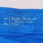 Fade to Blue azure blue cotton/ spandex skinny jeans. Mid rise. Size 28. Photo 3