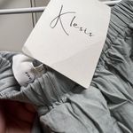 Princess Polly NWT tiered off shoulder sage green mini dress Photo 2