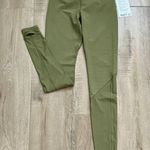 Lululemon Nulu and Crisscross Mesh Stirrup Tight Bronze Green size 4 NWT Photo 4