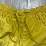 FP Movement Gold Women's Athletic Shorts. Size Small Yellow Photo 1