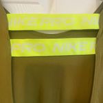 Nike  Pro women's training t-shirt in an olive green color with open back size M Photo 11