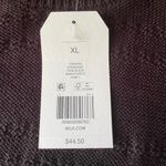 Wonderly  Women's Classic Black Rib Knit Fringe 2 Tier Hem Sleeveless Sweater Photo 11