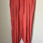 Anthropologie coral satin joggers Photo 3