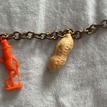 Vintage Advertising PLANTERS MR PEANUT Figural Plastic Charm Bracelet 7” Long Orange Photo 1