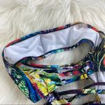 Abstract Plunging Strappy Cheeky Colorful Cutout Bathing Suit Photo 9