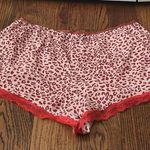Victoria's Secret Victoria Secret Orange and pink pajama shorts Sz L NWOT Photo 1