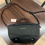 Michael Kors .
Crossbody Bag Preowned with wear! Photo 0
