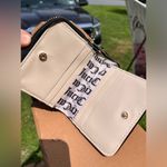 Juicy Couture  Flawless Quilted Zip Around Wallet Black Heart Logo NWT Photo 1