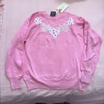 Urban Outfitters  pink heart sweater Photo 0
