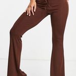 Bershka wrap around flare trouser in chocolate-brown Photo 0