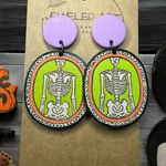 JEWELED ART Spooky Skeleton Oval Earrings Hand Painted Wood Halloween Green Photo 0