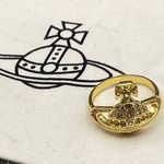Vivienne Westwood  Elegant Gold-Tone Ring with Orb Design Photo 0