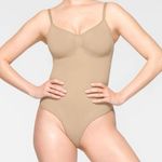 SKIMS NWOT  Briefs Bodysuit Seamless Sculpting Clay Color Size S/M Photo 0