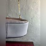 Kate Spade crossbody w adjustable strap
Lovely bag EUC, two tone shades of taupe Photo 8