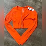 Garage Women's crop Orange Zip-Up Top Photo 0