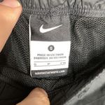 Nike ‎ windbreaker capris pants size small black Photo 2
