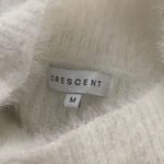 Crescent white fuzzy sweater Photo 3
