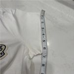  Tee Only worn once, looks and feels brand new. All tags still attached. Elevate your casual wardrobe with this Moncler white t-shirt. Photo 11