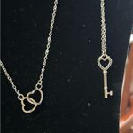 Silver costume 4 necklaces two sides of butterfly key and linked hearts preowned Photo 2
