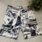 SheIn White newspaper print biker shorts Photo 0