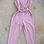 Milk and Honey Rafferiza Cinched Waist Pleated Casual Jumpsuit  •Size -Small •Neckline-V neck •Style-Elegant •Color-pink  •Composition-95%polyester / 5% Elastane •With pockets  •Belt included •for best results, please compare measurements with your best fitting garments •any questions please ask •buy with confidence Photo 0