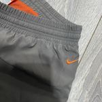 Nike  Womens 32x17 Cropped Capri Pants Lined Grey Orange Swish Medium (8-10) Photo 2