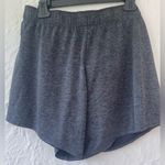 Nike gray women’s dri-fit athletic shorts with pink swoosh detailing; size XL Photo 5