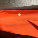 Lululemon Burnt Orange And Black Leggings Size 6 Photo 8
