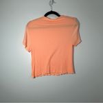 Free People Movement Women’s Madeline Funnel Baby Tee Lettuce Hem Size M/L Orange Size M Photo 2