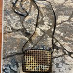 Vintage gold and black leather crossbody bag. 8x5 with‎ 24in strap. Photo 1