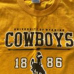 Gildan mustard yellow brown and white vintage university of Wyoming cowboys shirt Photo 2
