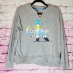 Calvin Klein GRAY TIE DYE WATERCOLOR FRONT LOGO SIDE SPLIT HEM LOUNGE SWEATSHIRT Photo 0