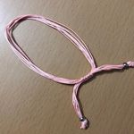 Light Pink Adjustable String Bracelet Photo 0